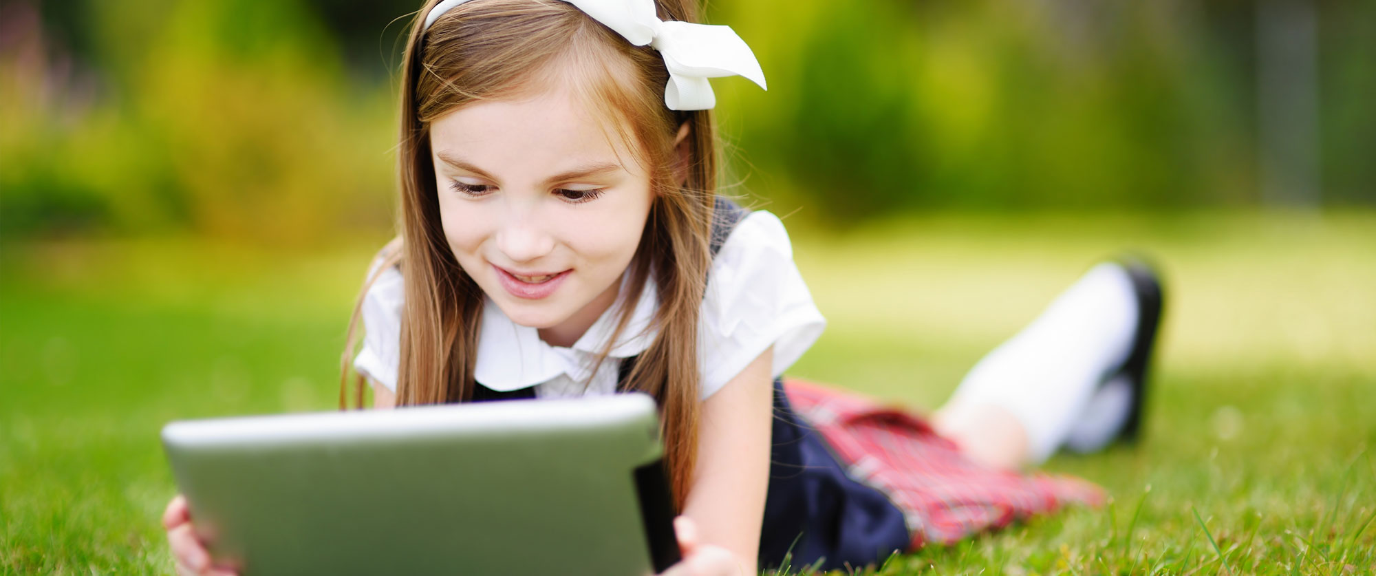 school girl with ipad